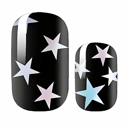 Black nail wraps featuring holographic pastel stars in celestial pattern design for at-home manicure