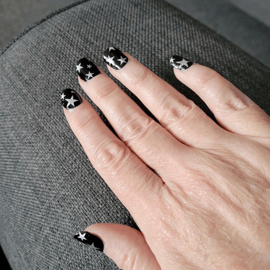 Black glossy nail wraps with silver star print, Holy Classics non-UV design