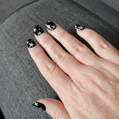Black glossy nail wraps with silver star print, Holy Classics non-UV design