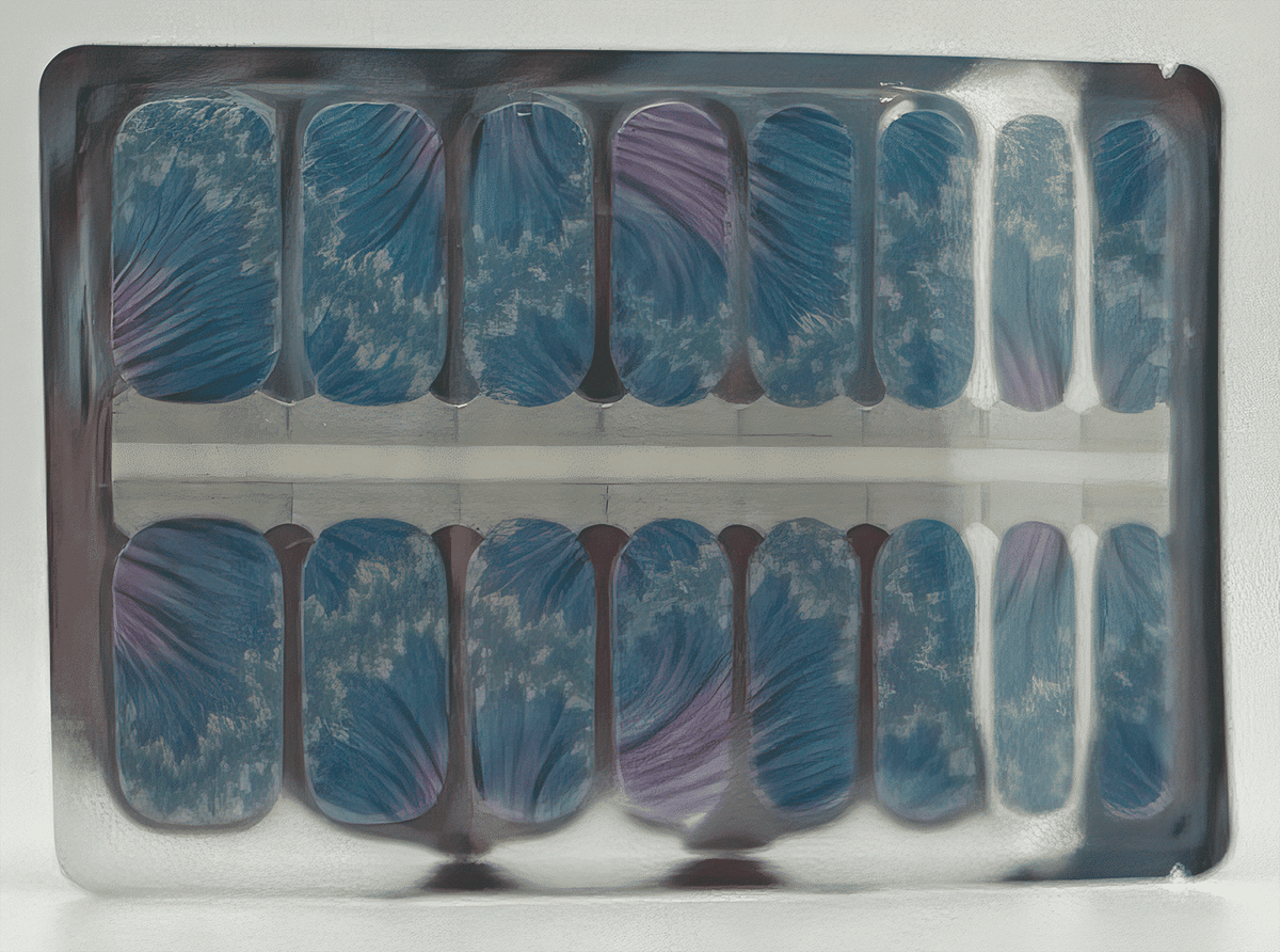 Blue marble wave nail wraps sheet showing abstract oceanic pattern for at-home manicure