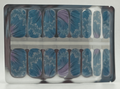 Blue marble wave nail wraps sheet showing abstract oceanic pattern for at-home manicure