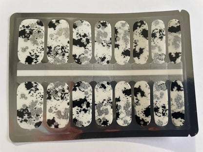 Monochrome spray paint nail wraps with black grey splatter effect on clear sheet