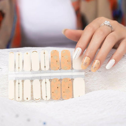 Non-UV nail wrap sheet showing champagne glitter and white star designs for manicure