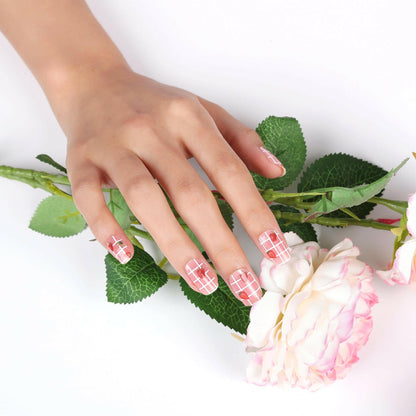 Holy Classics nail wraps, white windowpane plaid with strawberry fruit motif on sheer base