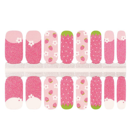 Pink strawberry nail wrap sheet showing glittery and fruit pattern designs for manicure