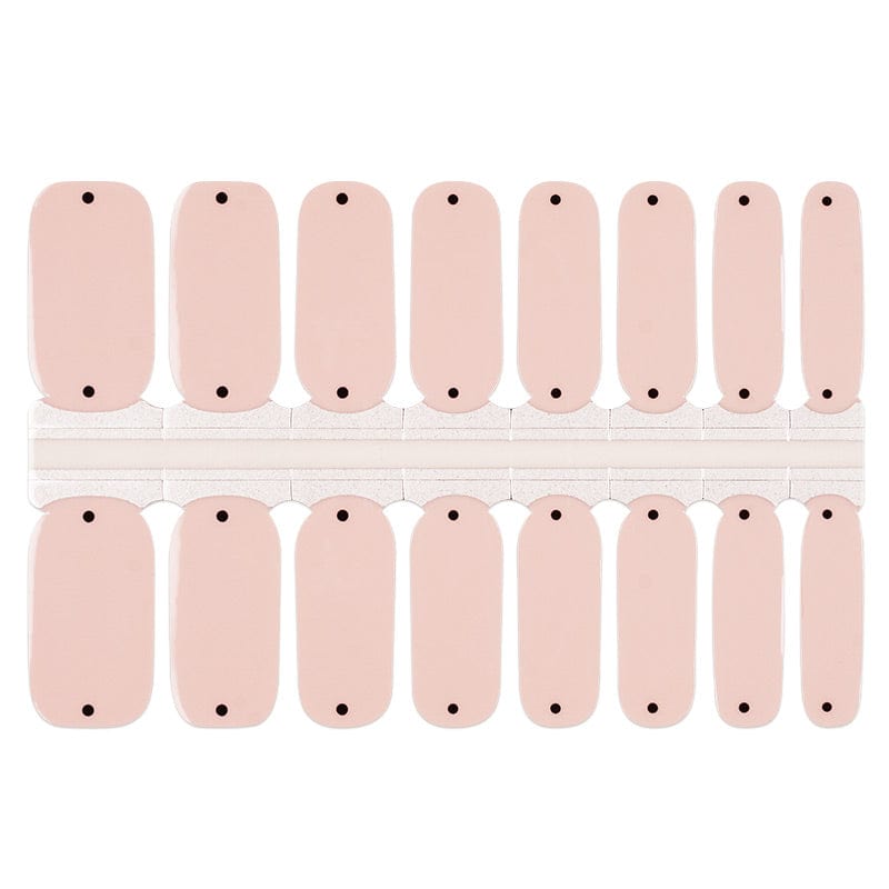 Nude pink nail wraps with black polka dots in classic minimalist design sheet