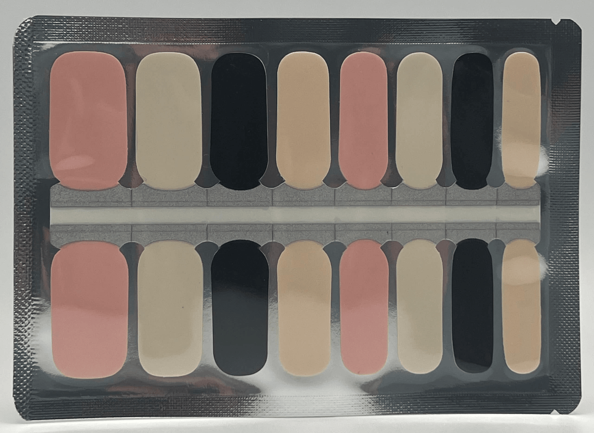 Sheet of dusty rose pink nail wraps with neutral tones for DIY manicure