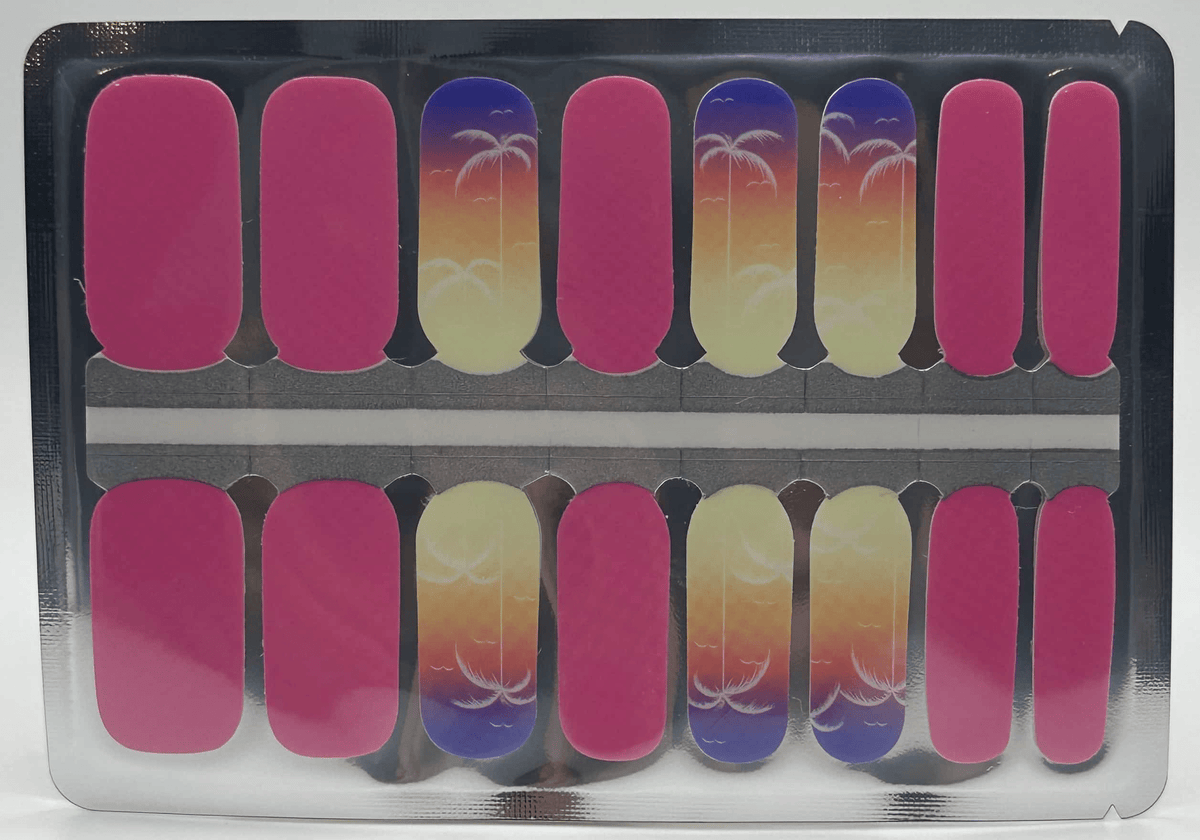 Sunset gradient nail wraps with palm tree silhouettes in pink purple yellow ombre design