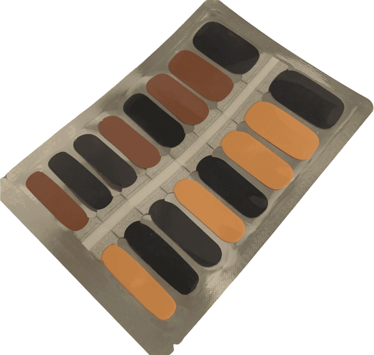 Brown and orange nail wraps in terracotta shades for warm autumn manicure