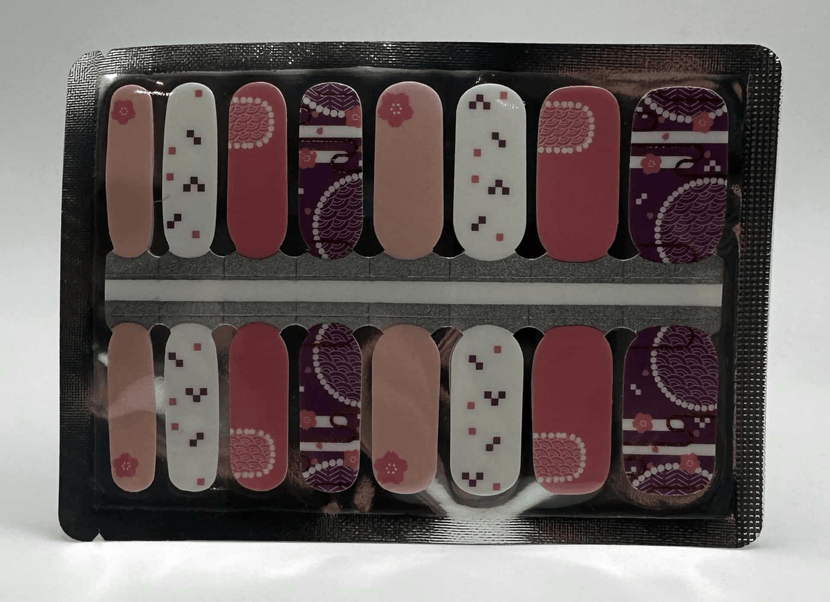 Mixed design nail wraps in burgundy pink and nude with floral geometric patterns