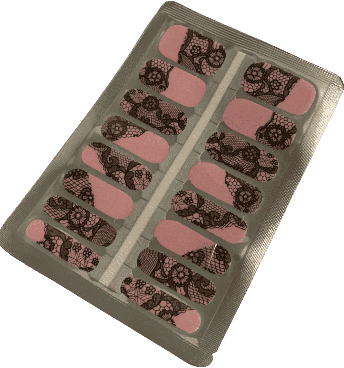 Non-UV nail wraps sheet featuring black lace pattern on pink base for manicure