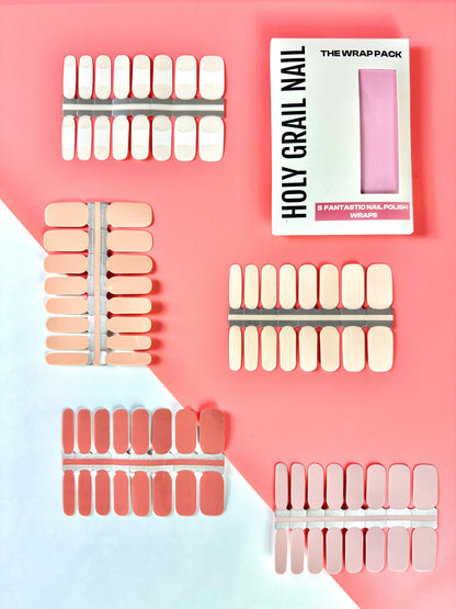 Light nude nail wraps collection showing peachy pink beige neutral shades for natural manicure