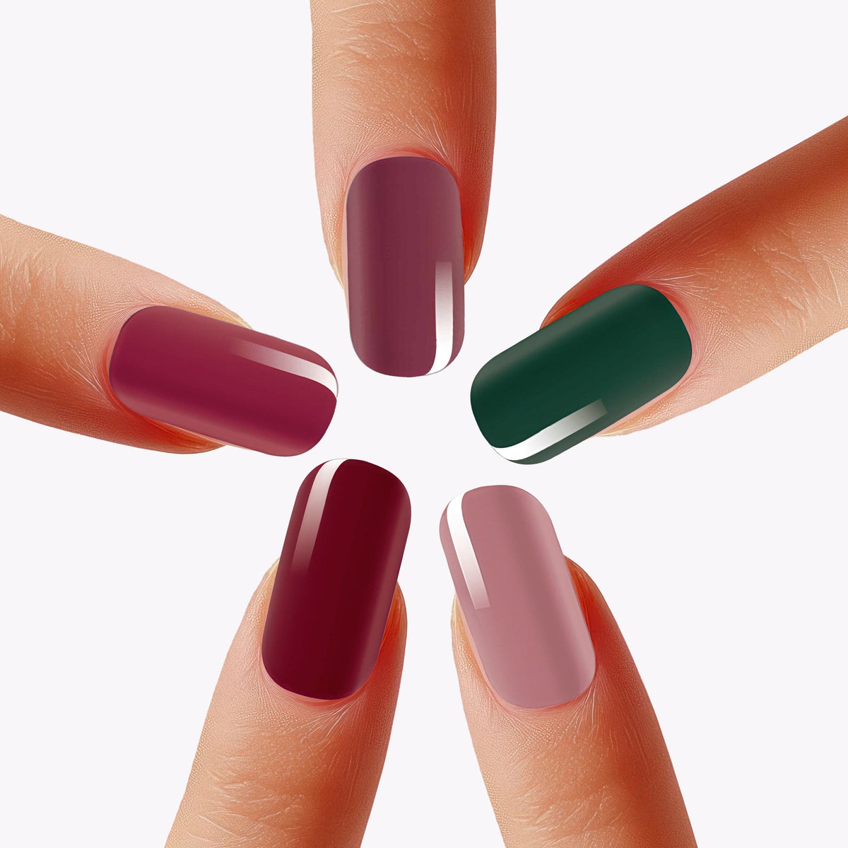 Jewel tone nail wraps in burgundy, purple, green and pink displayed in circular formation