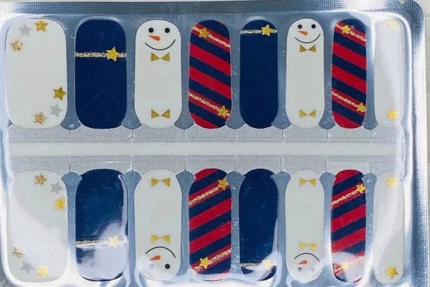 Christmas nail wrap sheet featuring snowman faces, navy blue, and red striped holiday nail art designs