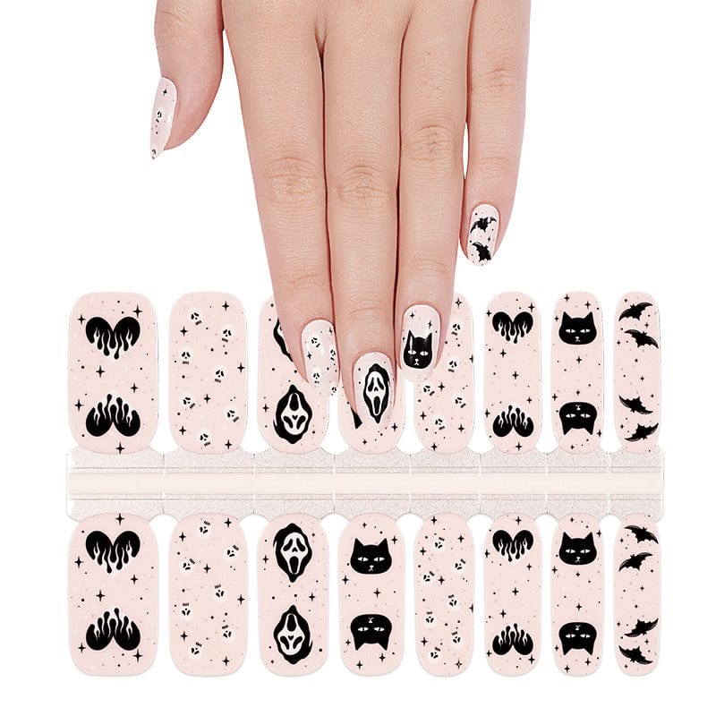 Non-UV Halloween nail wraps sheet showing black cats, ghosts and spooky patterns