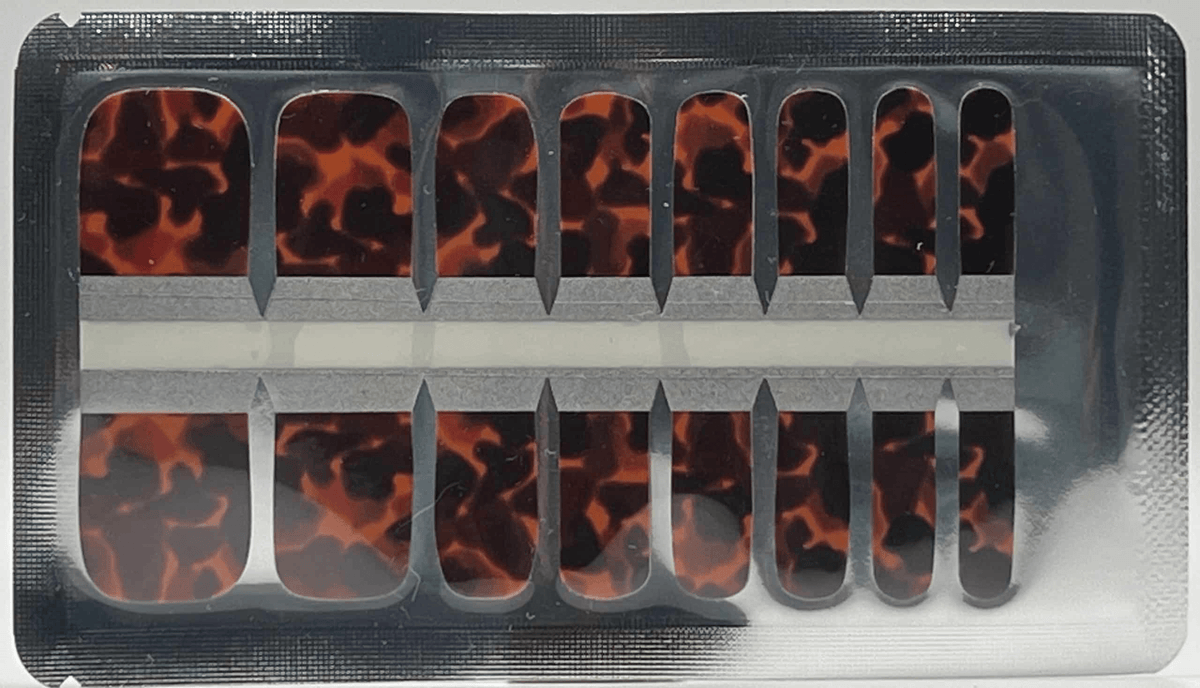 Tortoiseshell pedicure nail wraps in packaging showing brown animal print pattern