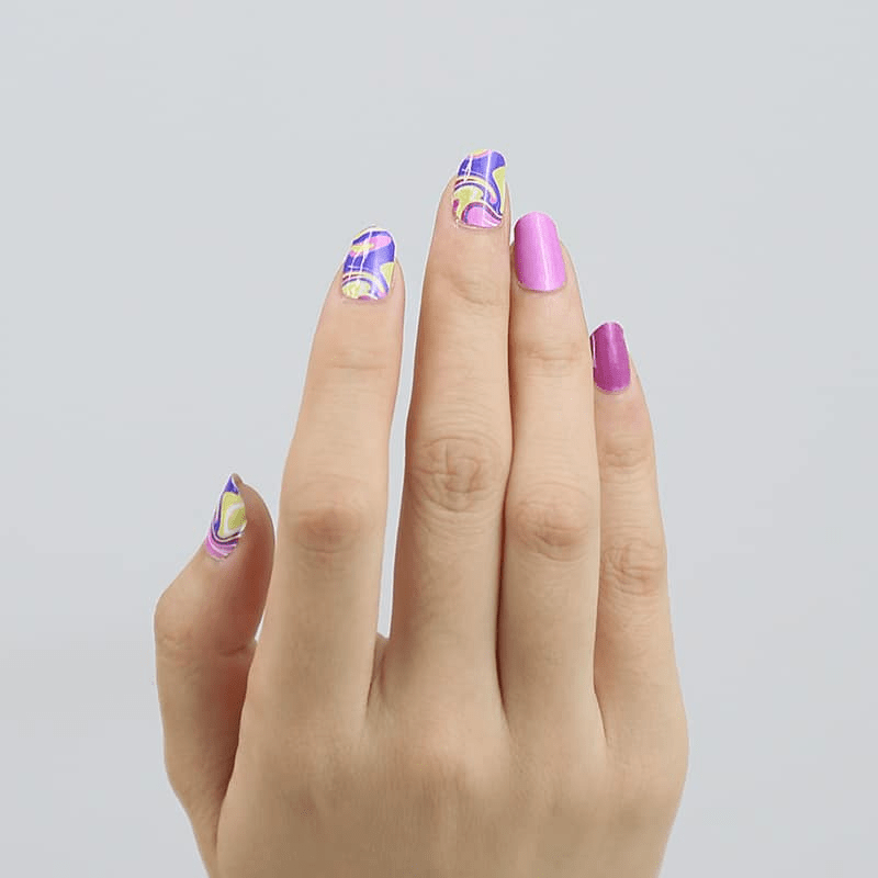 Holy Classics nail wraps with purple swirl print, lilac and magenta accent nails