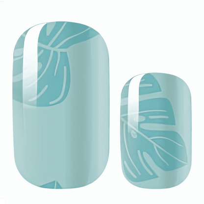 Turquoise nail wraps with subtle metallic leaf pattern for elegant manicure