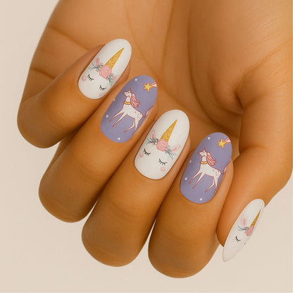 Holy Classics nail wraps: white and lilac with unicorn faces and star motifs
