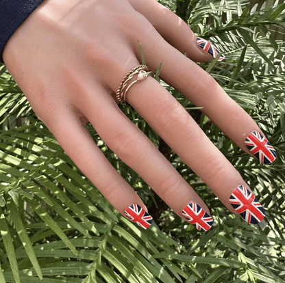 Union Jack nail wraps on hand British flag red white blue patriotic nail art