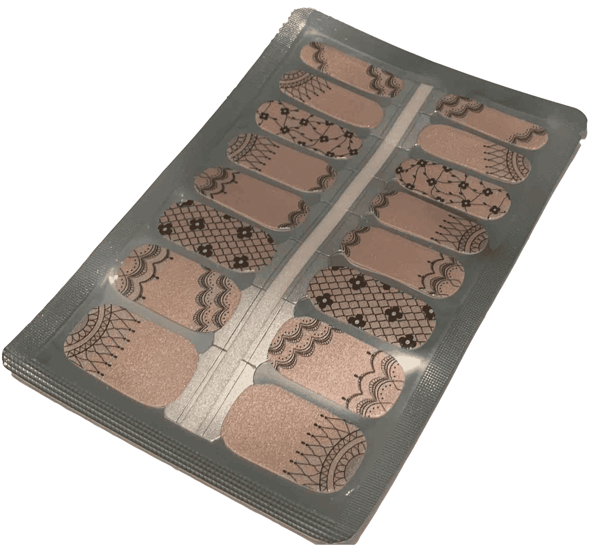 Victorian nail wraps sheet showing black lace patterns on nude background for manicure