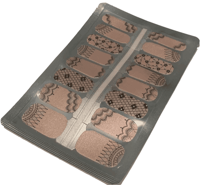 Victorian nail wraps sheet showing black lace patterns on nude background for manicure