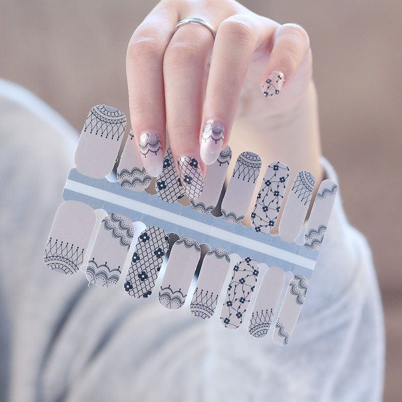 Victoriana black lace nail wraps sheet showing intricate vintage pattern designs for manicures
