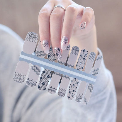 Victoriana black lace nail wraps sheet showing intricate vintage pattern designs for manicures
