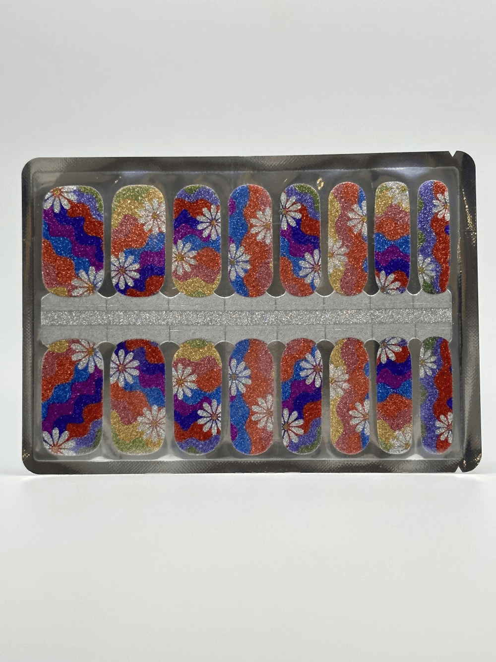 Multicolour glitter nail wraps with daisy flower patterns in packaging set