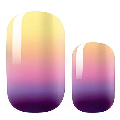 Sunset ombre nail wraps with yellow to purple gradient finish