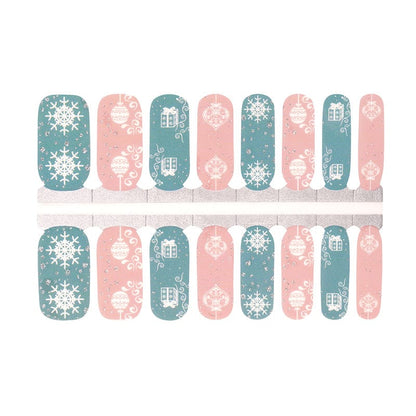 Non-UV nail wraps sheet showing Christmas patterns in sage blue and dusty rose with snowflakes
