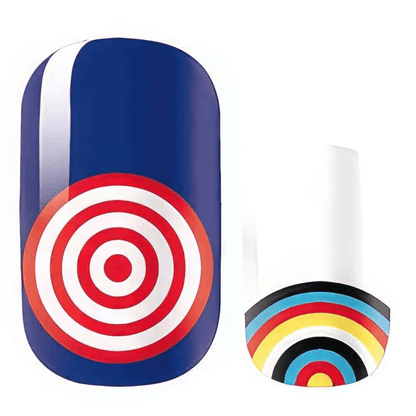 Red white target bullseye nail wrap design with blue background showing retro geometric nail art
