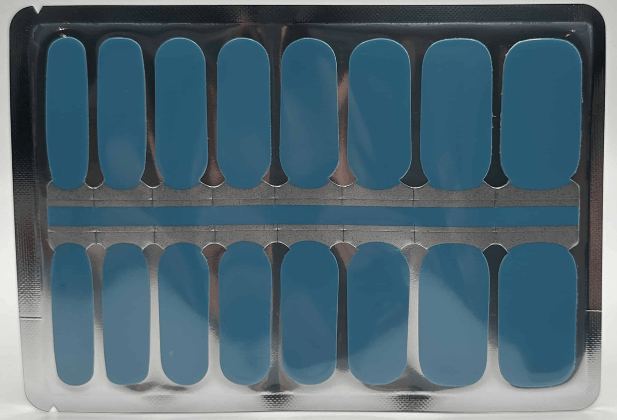 Solid teal-blue glossy nail wraps on sheet, Holy Classics non-UV design.