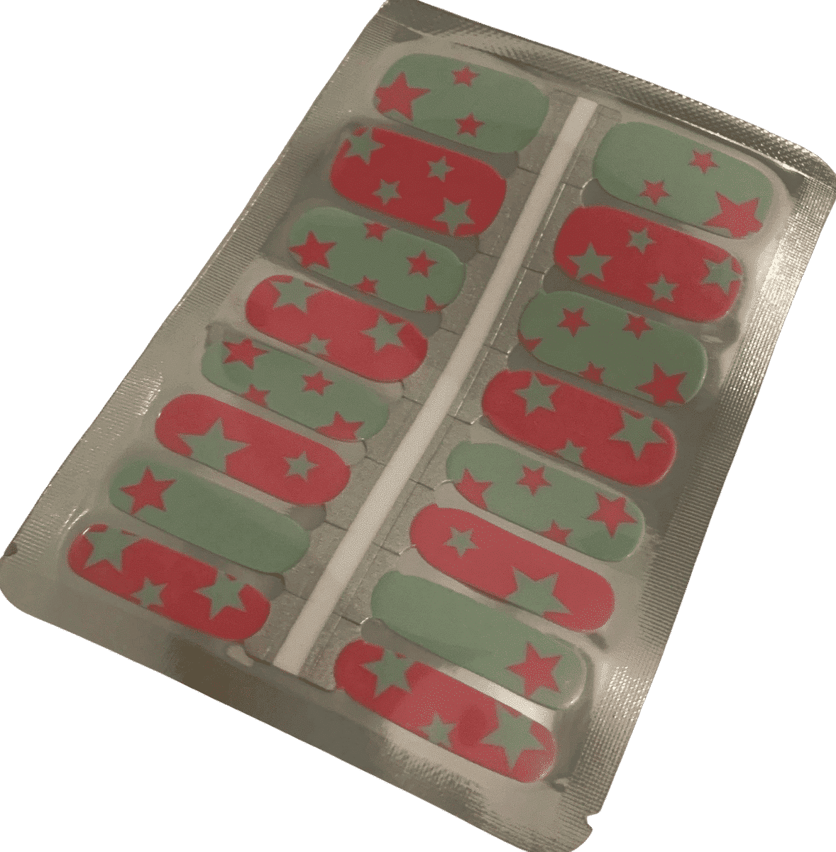 Non-UV nail wraps sheet featuring pink coral stars on mint green background pattern