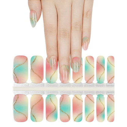 Pastel mint green and pink watercolour non-UV nail wraps with gold marble veining on hand