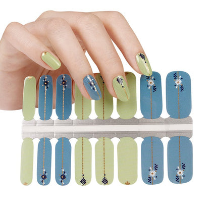 Non-UV nail wraps sheet showing blue and sage botanical floral designs for manicure