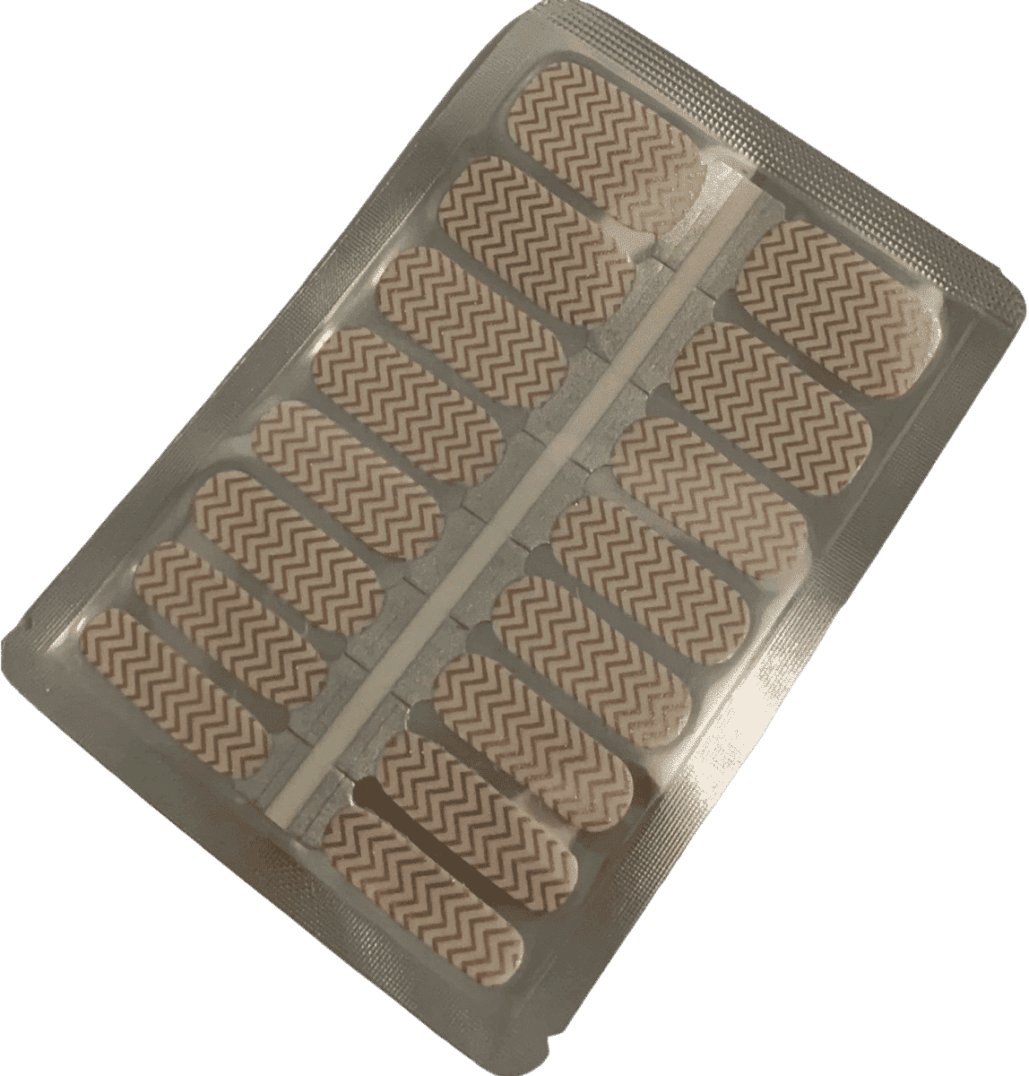 Non-UV nail wraps sheet featuring gold geometric chevron patterns on transparent base for at-home manicure