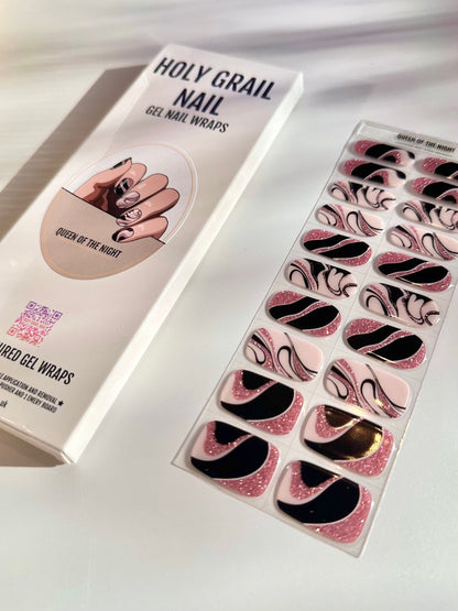Pink glitter gel nail wraps with black swirl patterns and packaging for at-home manicure