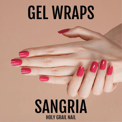 Two hands displaying sangria red gel nail wraps with glossy wine finish