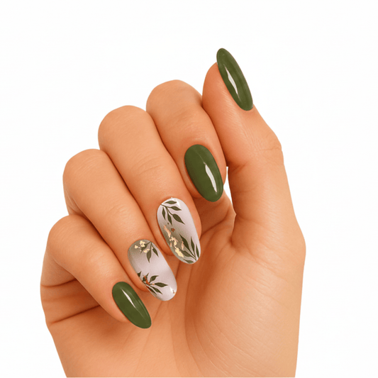 Green gel nail wraps with botanical leaf patterns on hand manicure