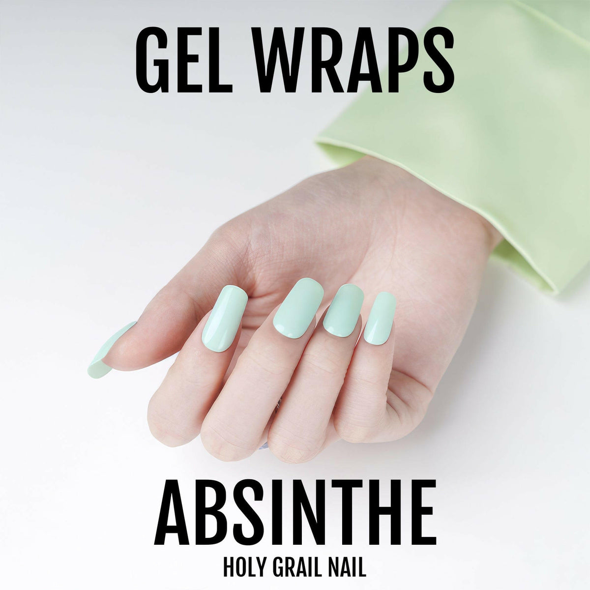 Hand wearing pastel mint green gel nail wraps for at-home manicure