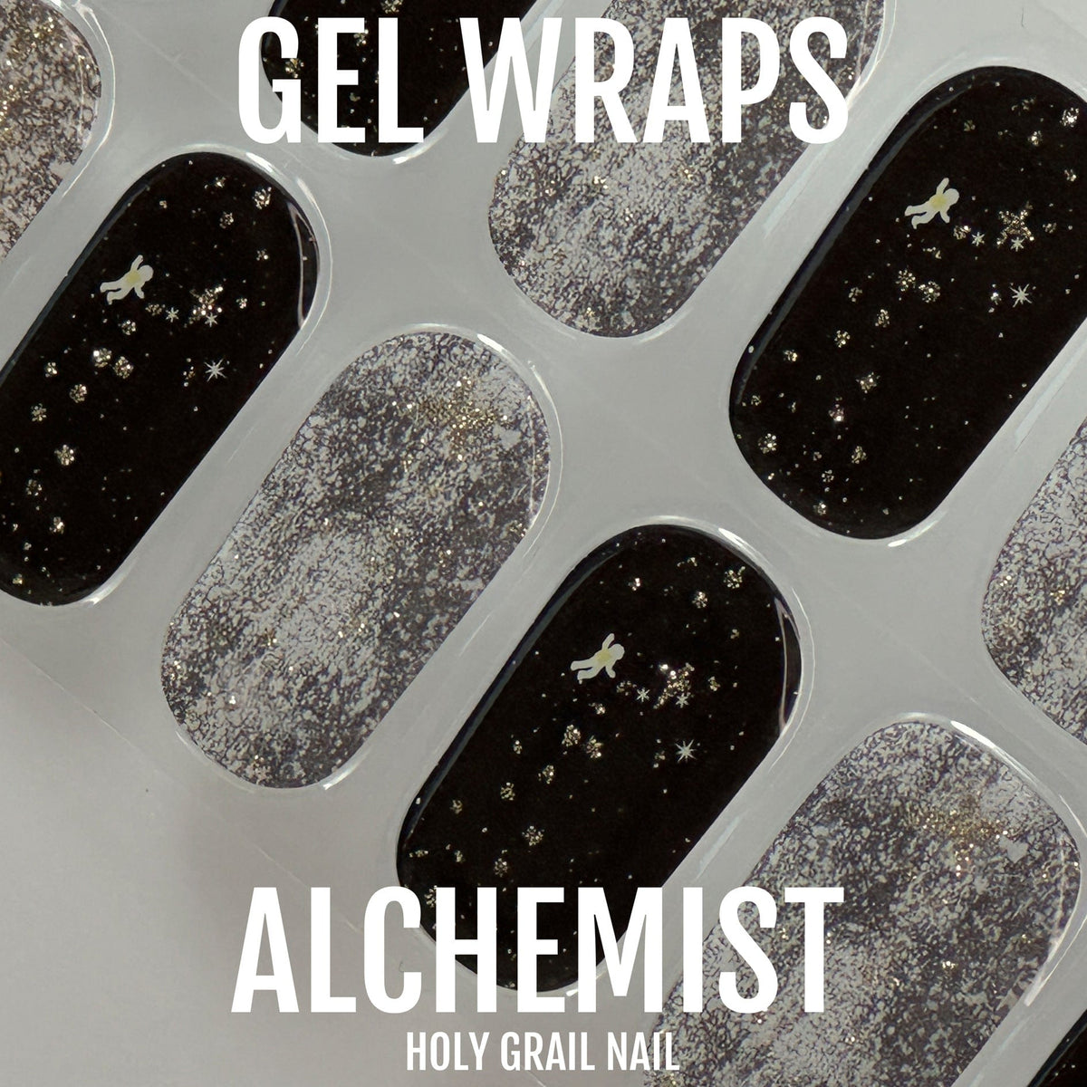 Black and silver glitter gel wraps with star nail art pattern close-up view