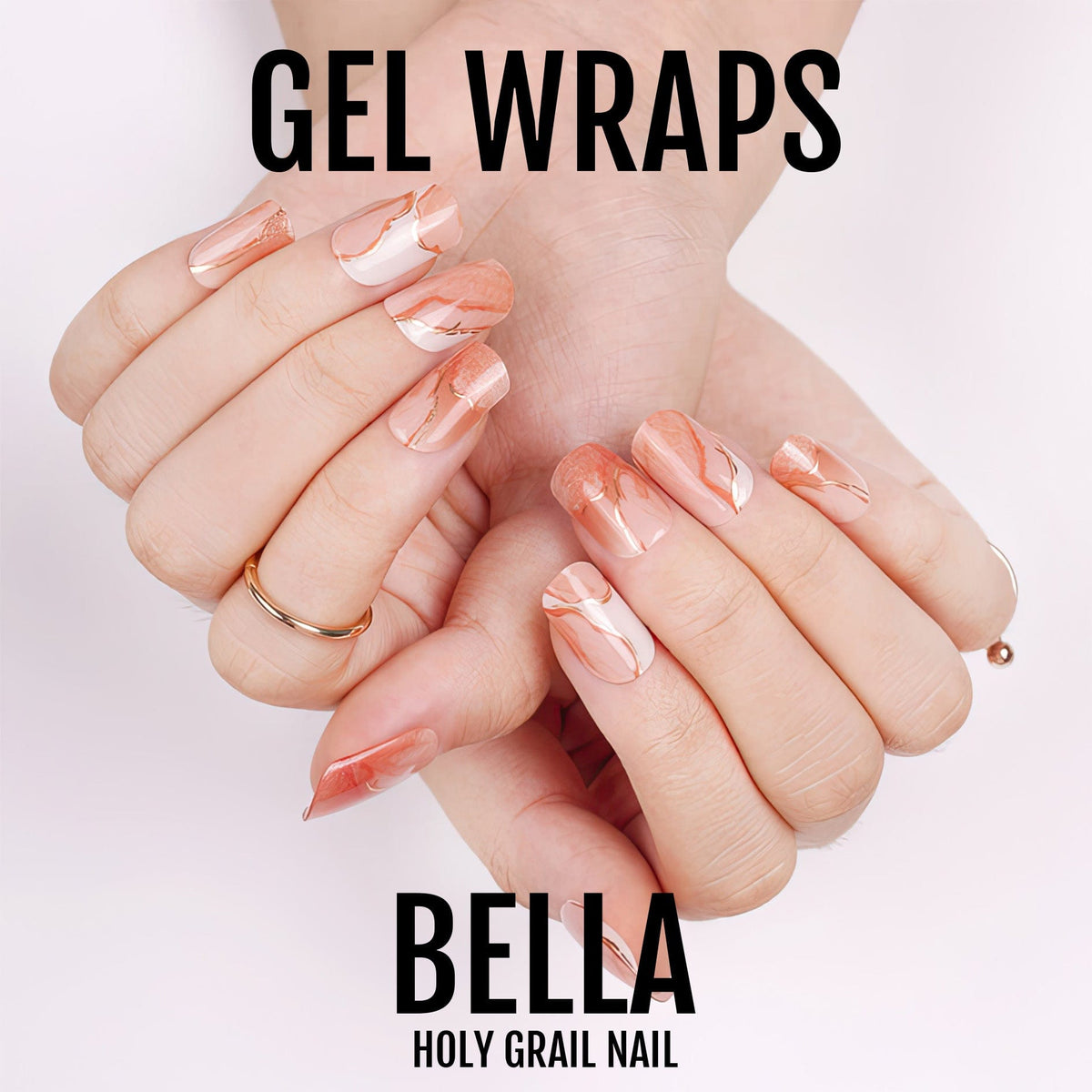 Coral pink marble gel nail wraps on hands showing glossy finish manicure