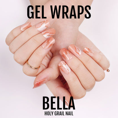 Coral pink marble gel nail wraps on hands showing glossy finish manicure