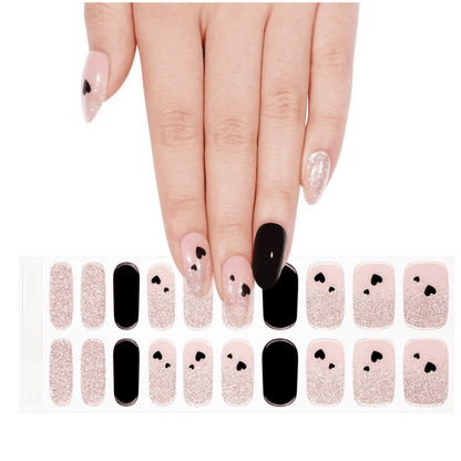 Black and pink glitter gel nail wrap sheet with heart nail art design