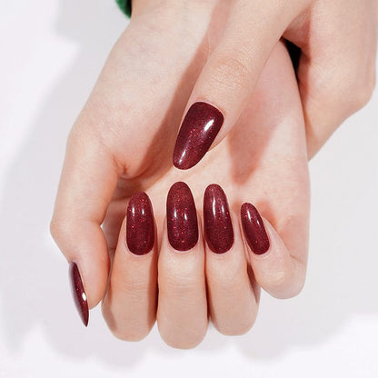 Burgundy sparkly gel nail wraps displayed on both hands with glossy finish