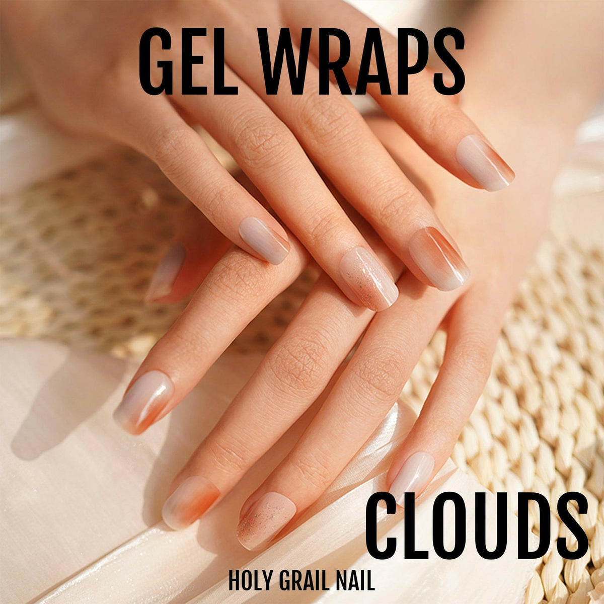 Nude cloud pattern gel nail wraps on hand showing natural manicure look