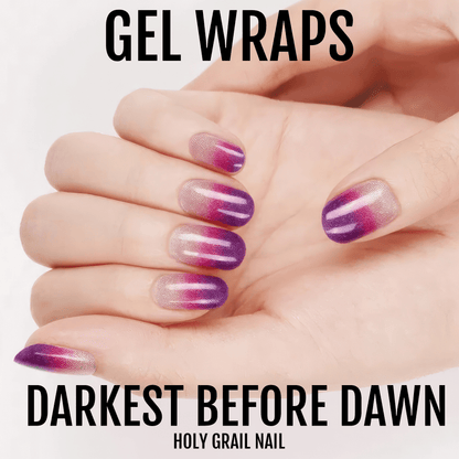 Hand displaying purple ombre gel nail wraps with gradient fade manicure design