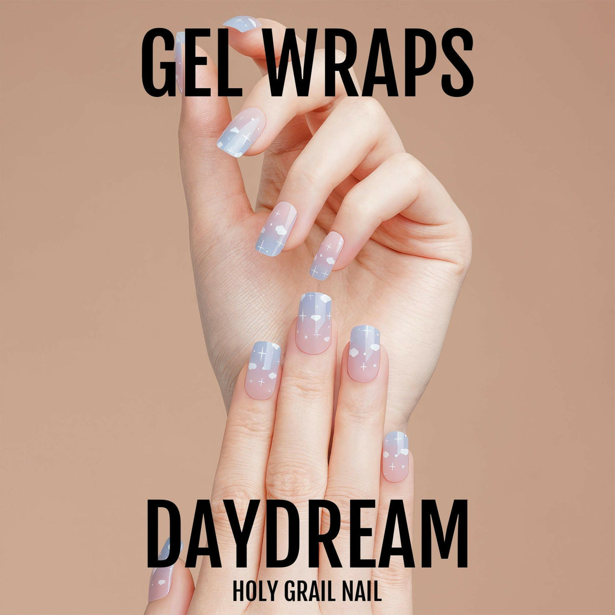 Blue cloud pattern gel nail wraps on hand showing dreamy sky nail art design
