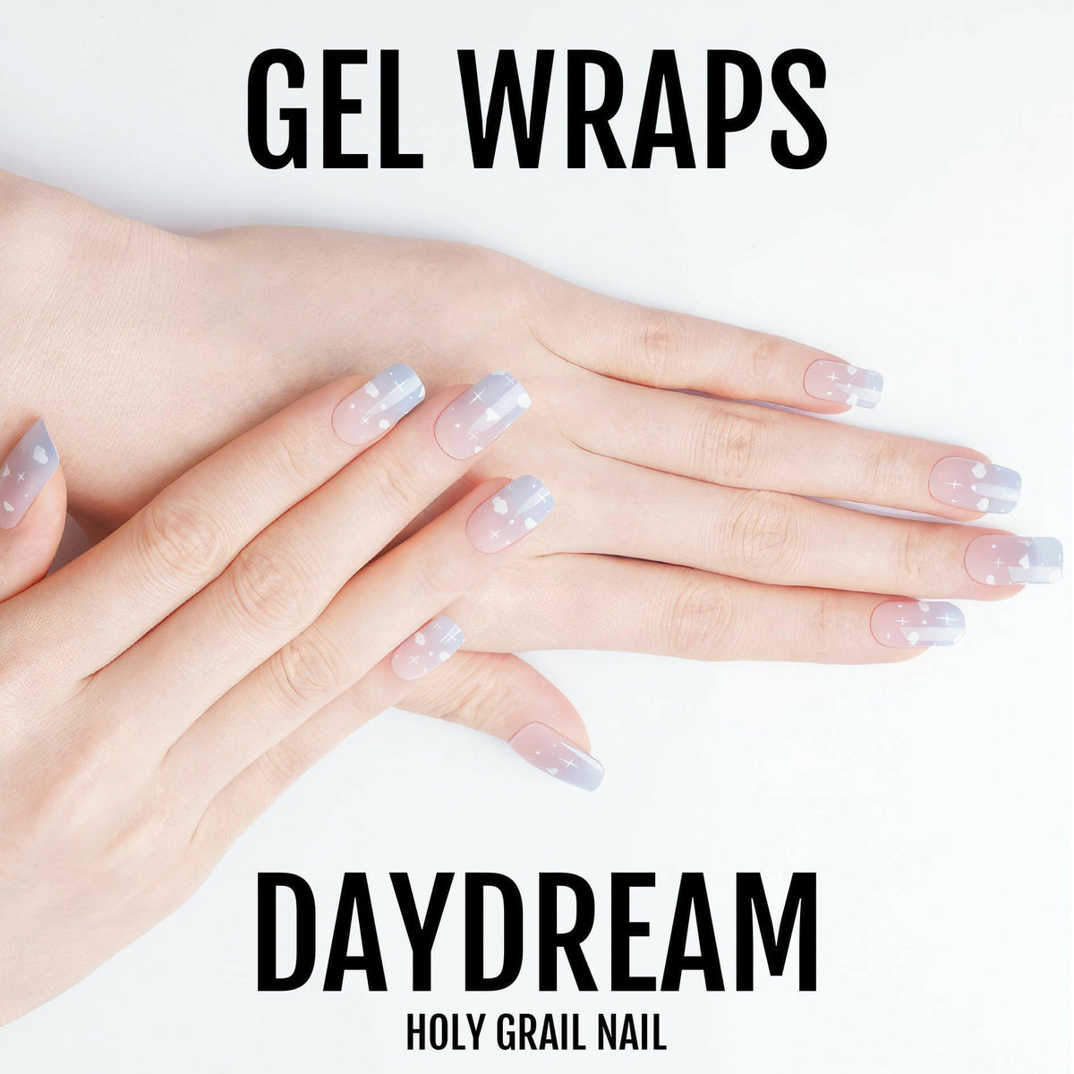 Hands displaying blue cloud gel nail wraps with heavenly sky pattern manicure